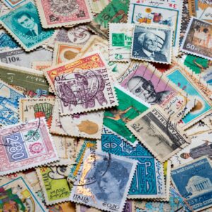 Can You Reuse Stamps, assorted postage stamps on blue and white textile